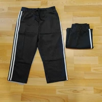 Oldalcsíkos pöttyös női nadrág gumis derékkal Fekete-3XL-4XL
