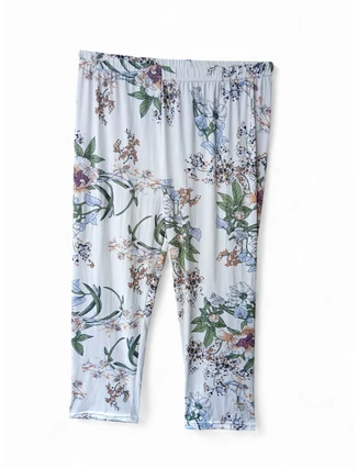 Női leggings gumis derékkal és virágmintával.