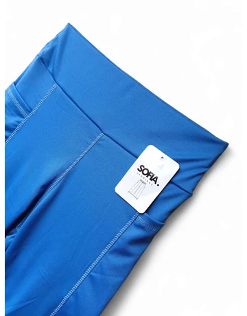 Kék capri leggings elöl zsebekkel és magasított derékkal.